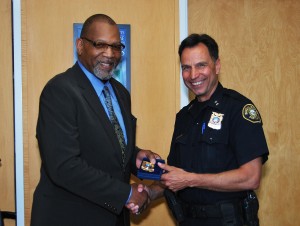 Commander Kevin Modica (left) with Portland Police Bureau Chief Mike Reese (right) at July promotion ceremony