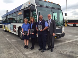 TriMet's honors its operators of the year: (L-R) Lyn Simons, Bus Operator of the Year; Catherine McLendon, Part-Time Operator of the Year; James Hilliard, MAX Operator of the Year join TriMet General Manager Neil McFarlane