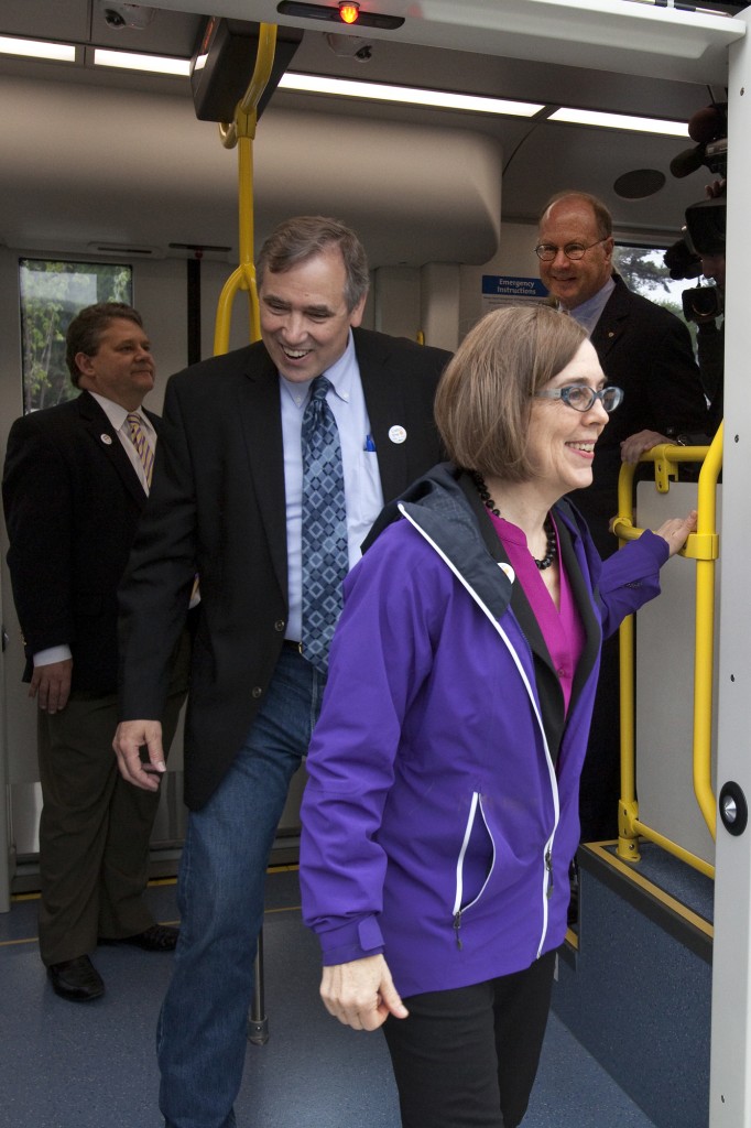 Oregon Gov. Kate Brown, U.S. Sen. Jeff Merkley and TriMet General Manager Neil McFarlane complete the first ride on the future MAX Orange Line.